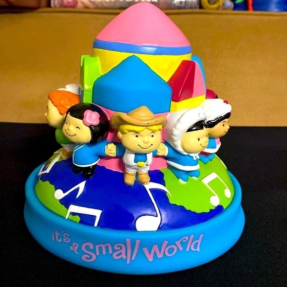 Disney Accessories - Disney vintage it’s a small world piggy bank Disneyland resort coin bank world
